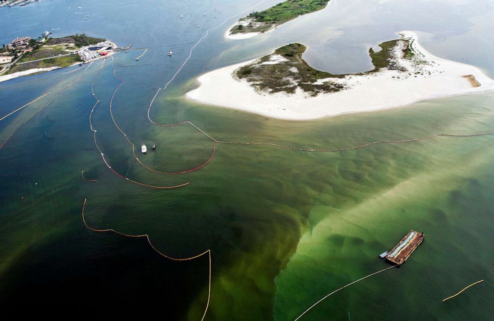 PHOTO: FILE - Boom is deployed to contain oil in Perdido Bay in Orange Beach, Ala., June 19, 2010.