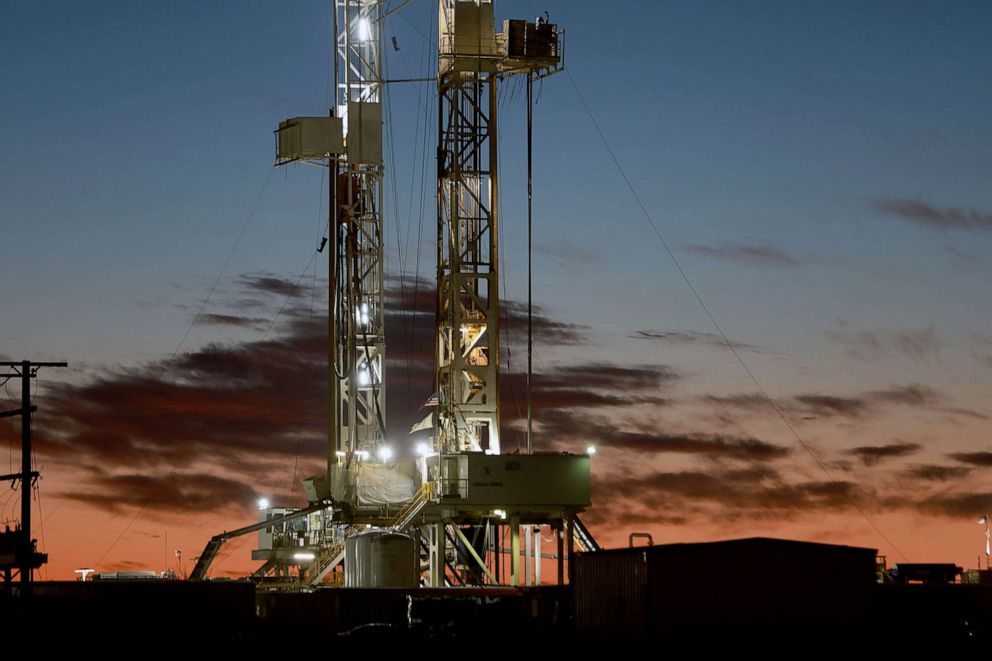 PHOTO: FILE - An oil drilling rig setup in the Permian Basin oil field, March 13, 2022 in Midland, Texas.
