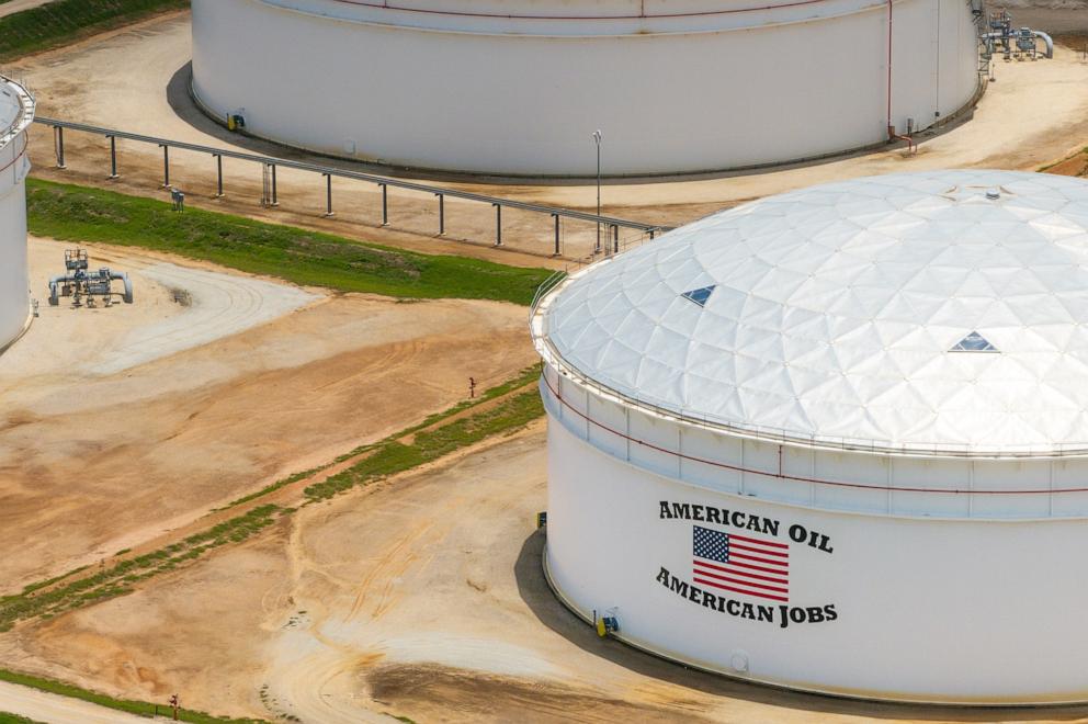 PHOTO: In an aerial view, oil storage tanks are seen at the Enterprise Sealy Station on June 19, 2025, in Sealy, Texas.