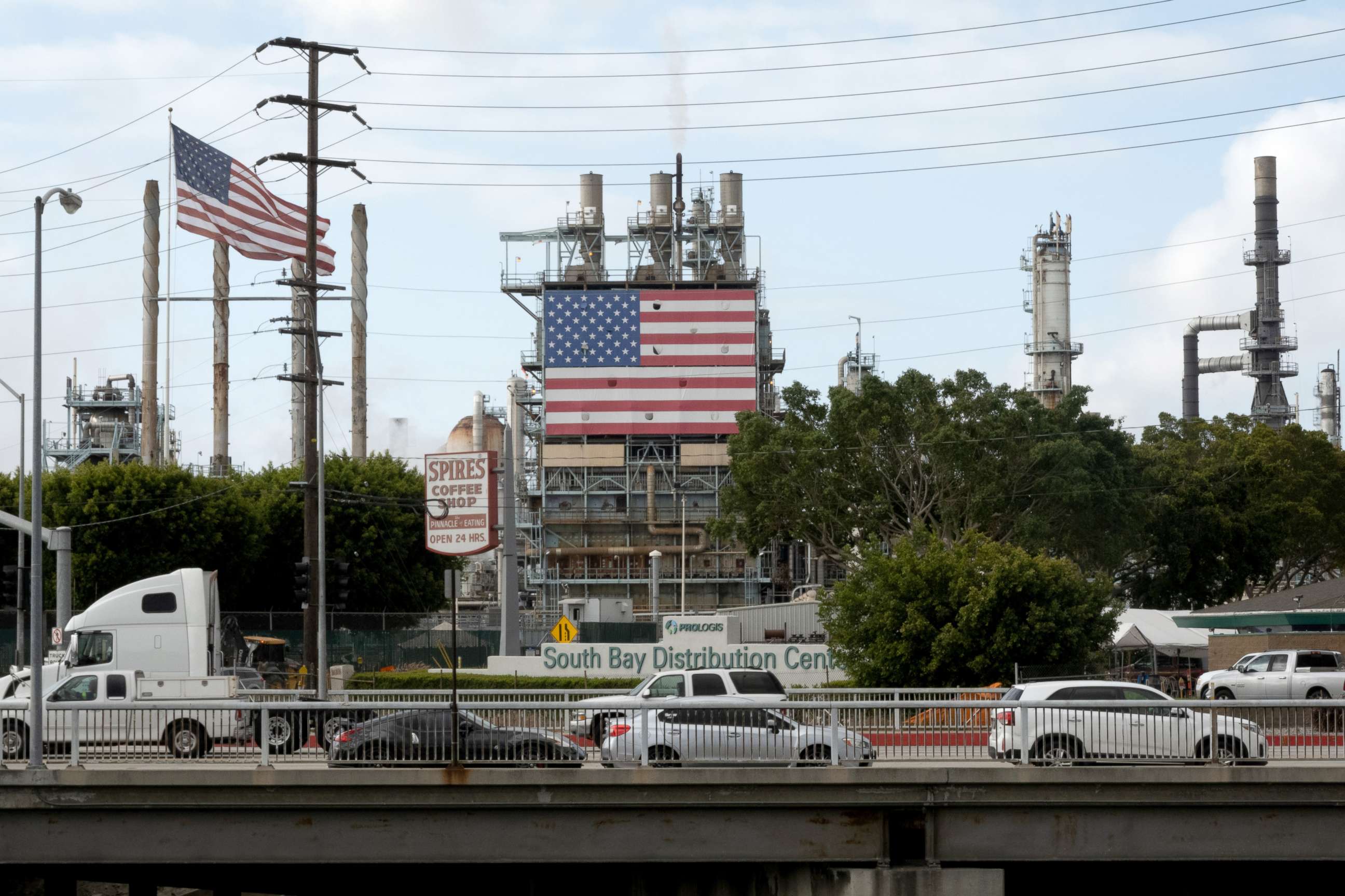 PHOTO: A U.S. flag flies outside the Marathon Petroleum Corp. Los Angeles Refinery in Wilmington, California, April 21, 2021.