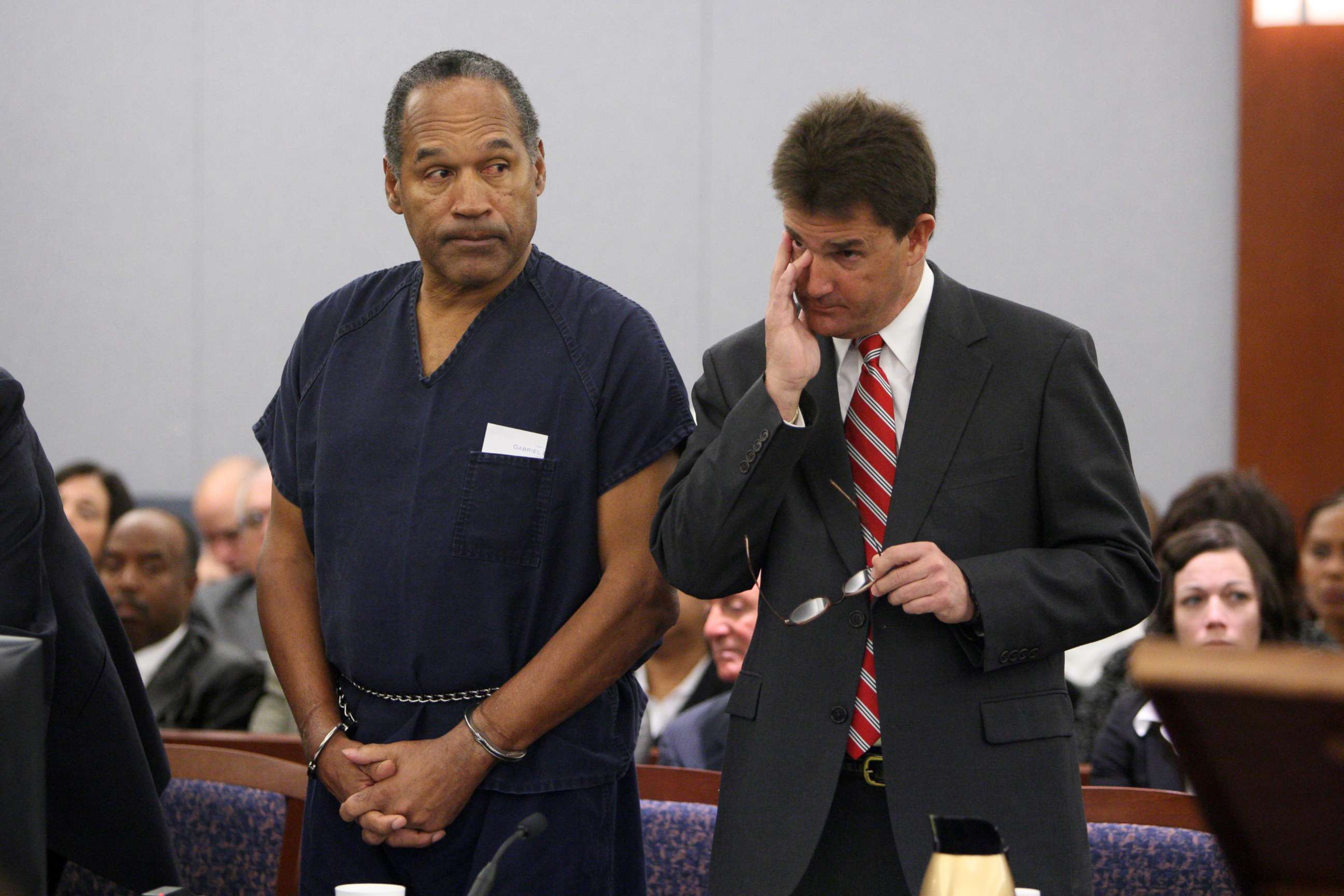 PHOTO: OJ Simpson stands in court with attorney Yale Galanter during his sentencing at the Clark County Regional Justice Center, Dec. 5, 2008, in Las Vegas. 