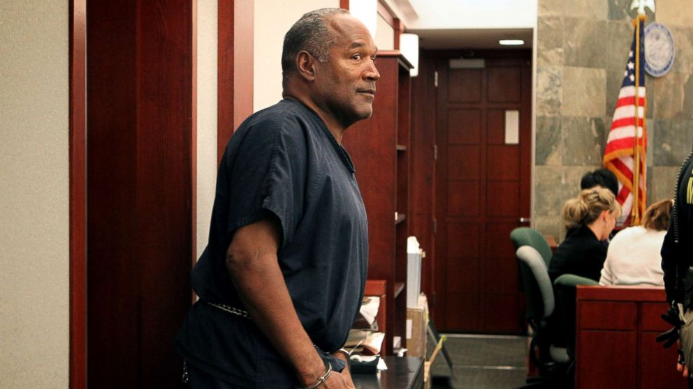 PHOTO: O.J. Simpson arrives in  evidentiary hearing in Clark County District Court, May 15, 2013, in Las Vegas.