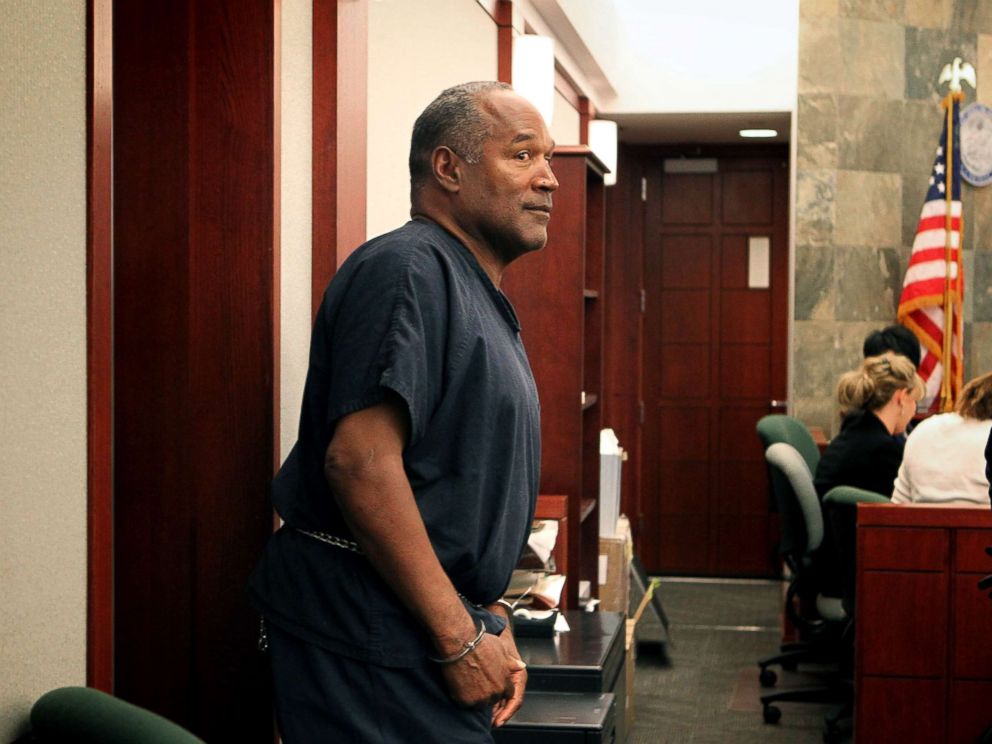 PHOTO: O.J. Simpson arrives in evidentiary hearing in Clark County District Court, May 15, 2013, in Las Vegas.