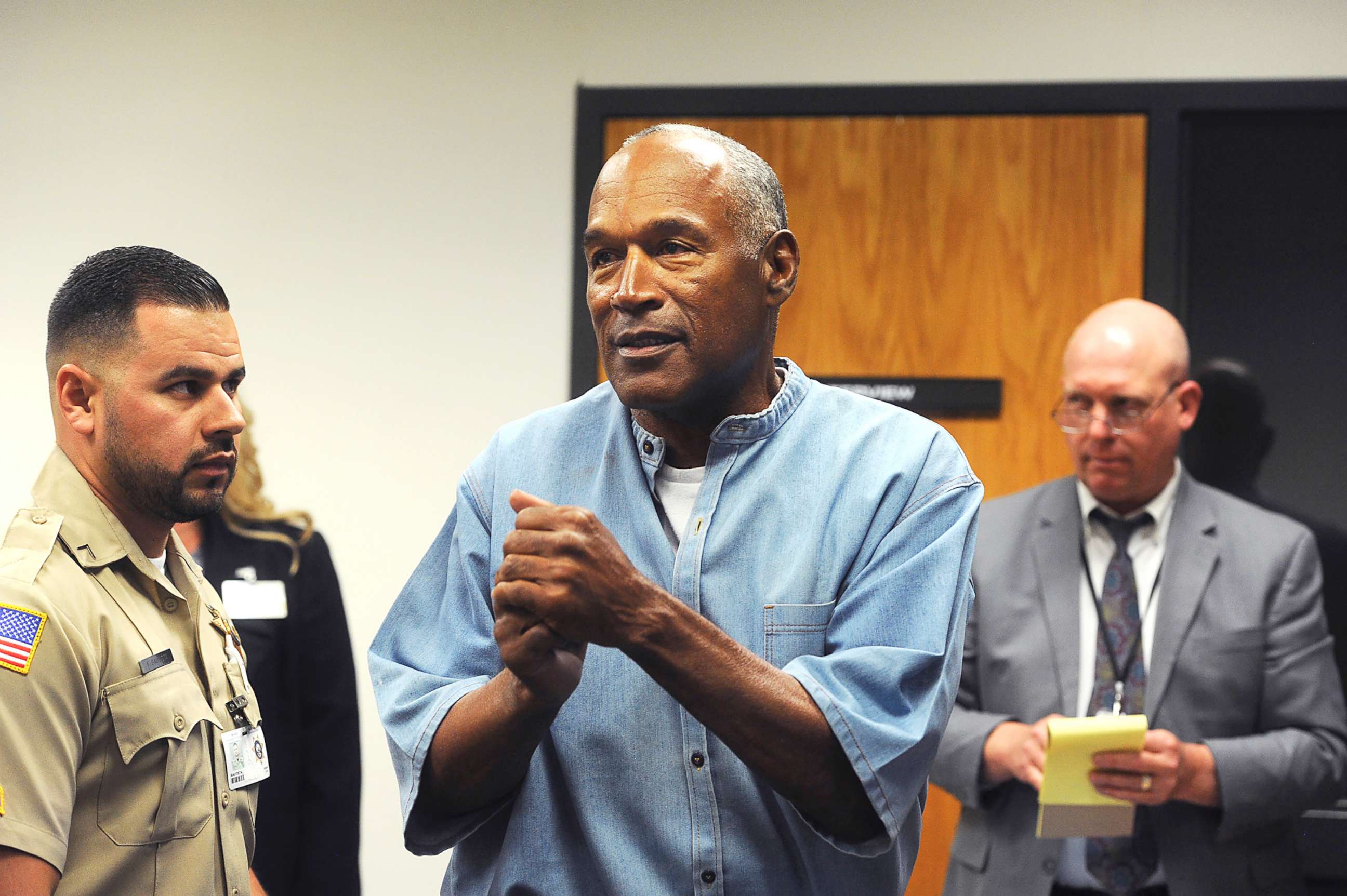 PHOTO: O.J. Simpson reacts after learning he was granted parole at Lovelock Correctional Center in Lovelock, Nev., July 20, 2017.
