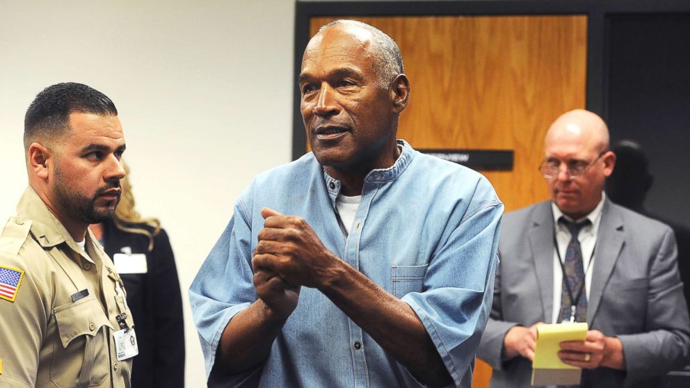 PHOTO: O.J. Simpson reacts after learning he was granted parole at Lovelock Correctional Center in Lovelock, Nev., on July 20, 2017.
