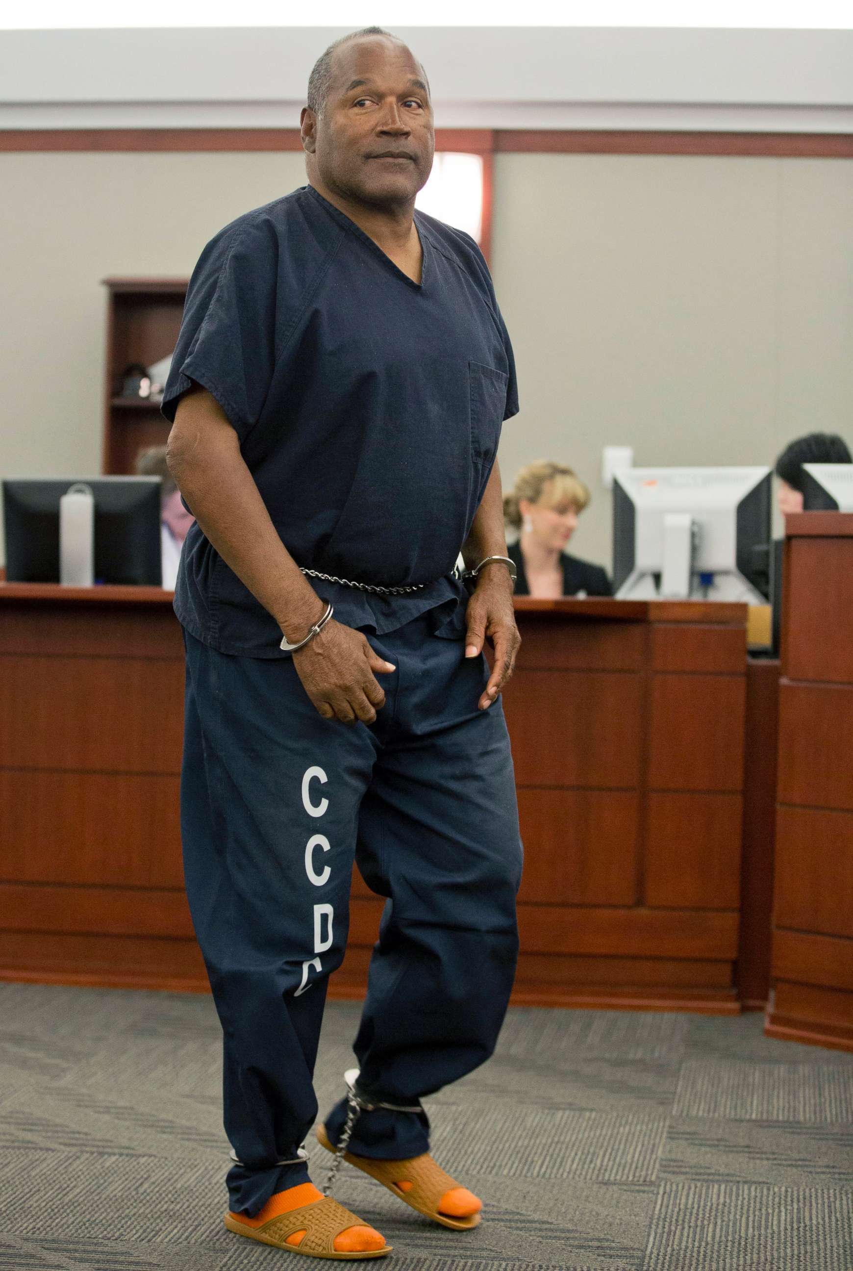 PHOTO: O.J. Simpson returns to the witness stand to testify after a break during an evidentiary hearing in Clark County District Court in Las Vegas, May 15, 2013.