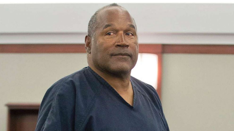 PHOTO: O.J. Simpson returns to the witness stand to testify after a break during an evidentiary hearing in Clark County District Court in Las Vegas, May 15, 2013.