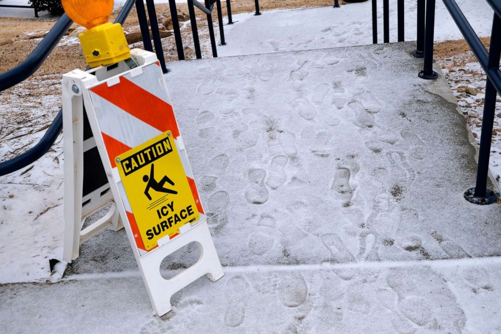 PHOTO: A sign warns people of icy conditions on the UCO campus as wintery weather hit the Edmond and other parts of the Oklahoma City, Okla., Jan.30, 2023.