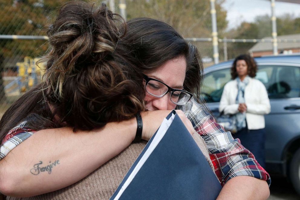 PHOTO: Danni Sloan Roberts, right, embraces her sister Sydney Roberts, left, after being released from the Eddie Warrior Correctional Center Monday, Nov. 4, 2019, in Taft, Okla.