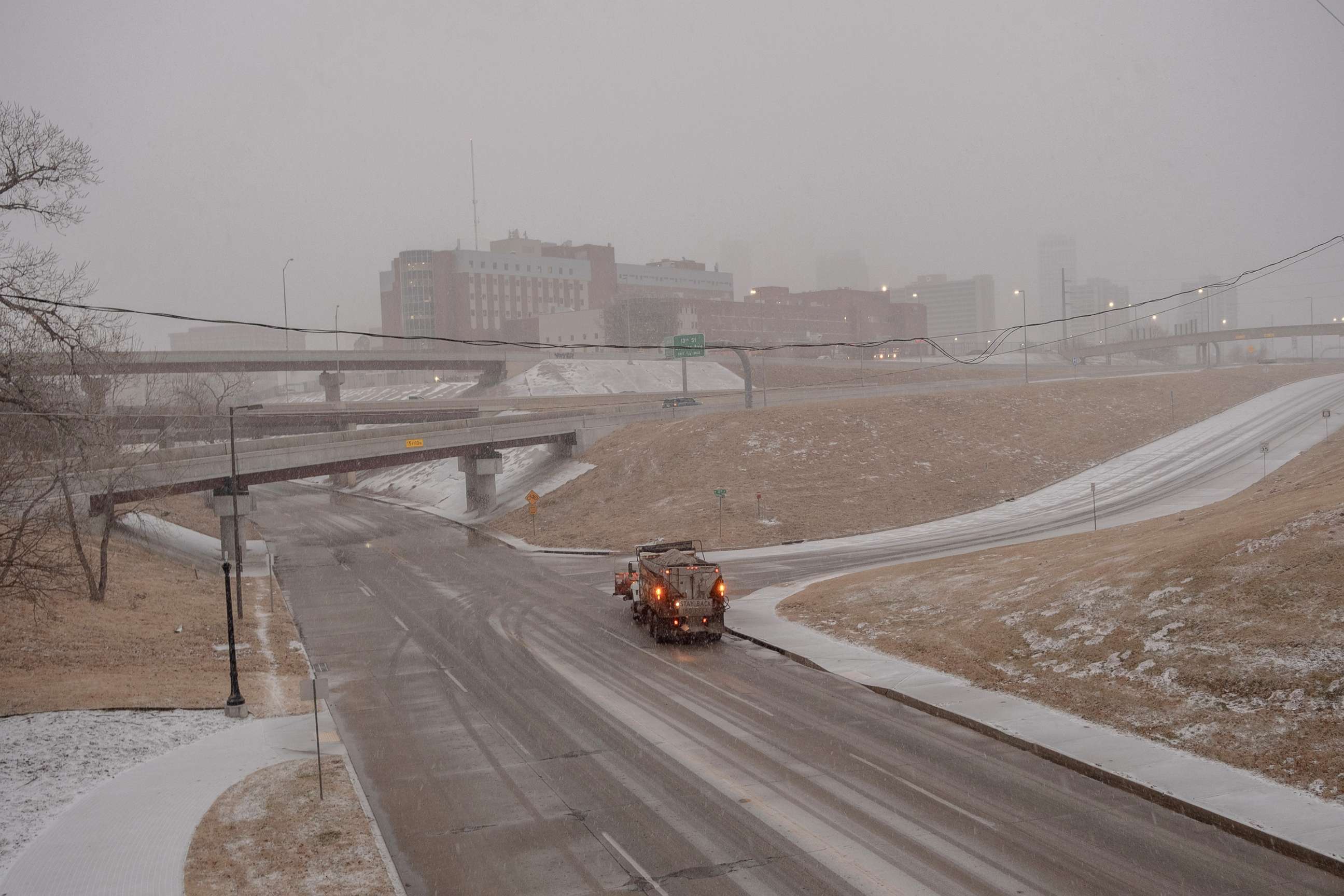PHOTO: A snowplow makes its way through the streets of Tulsa, Okla., on Feb. 2, 2022.