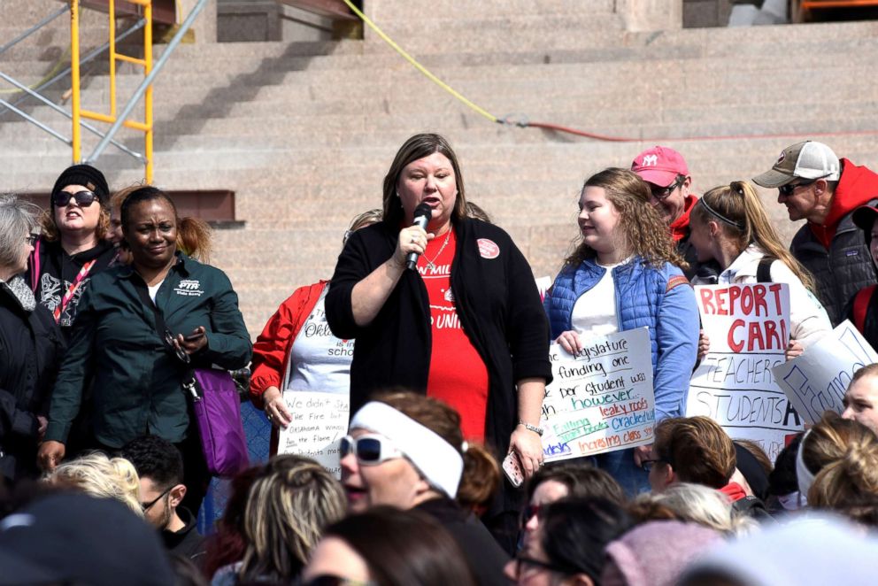 PHOTO: Alicia Priest, president of the Oklahoma Education Association, addresses teachers at a rally outside the state Capitol on the second day of a teacher walkout in Oklahoma City, Okla., on April 3, 2018.  