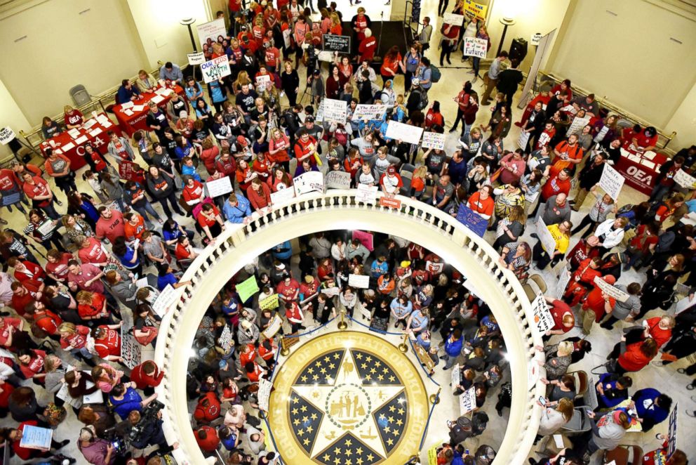 PHOTO: Teachers pack the state Capitol rotunda to capacity, on the second day of a teacher walkout, to demand higher pay and more funding for education, in Oklahoma City, Okla., on April 3, 2018.  