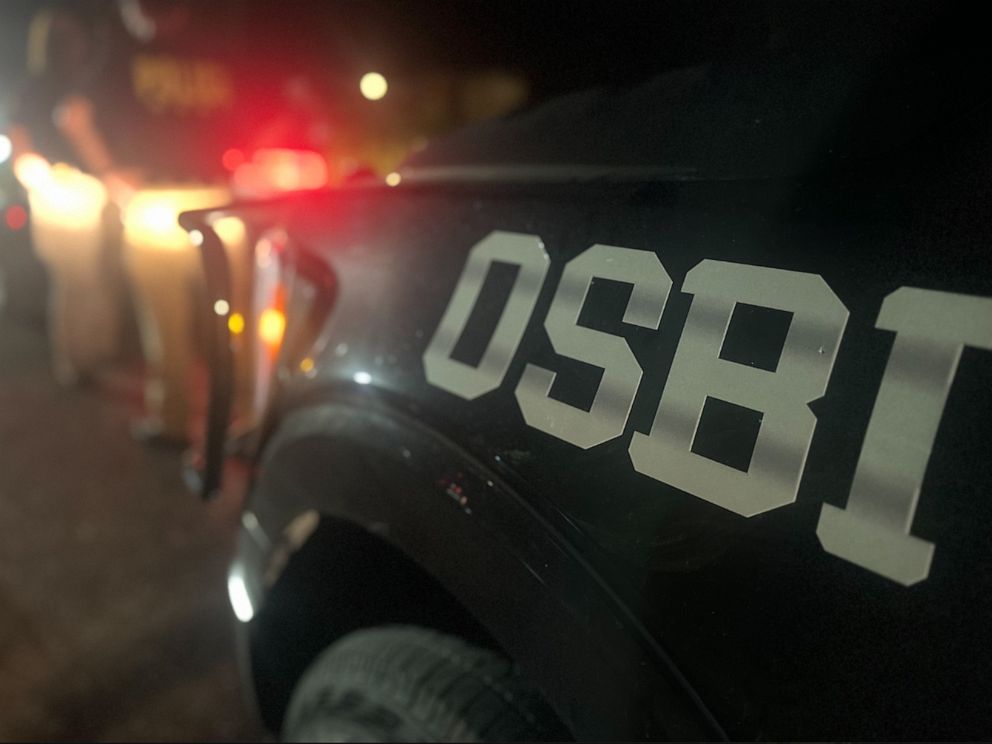 PHOTO: In this photo released by the Oklahoma State Bureau of Investigation, law enforcement officers are shown at the scene of a murder-suicide in Verdigris, Oklahoma, on July 20, 2023.