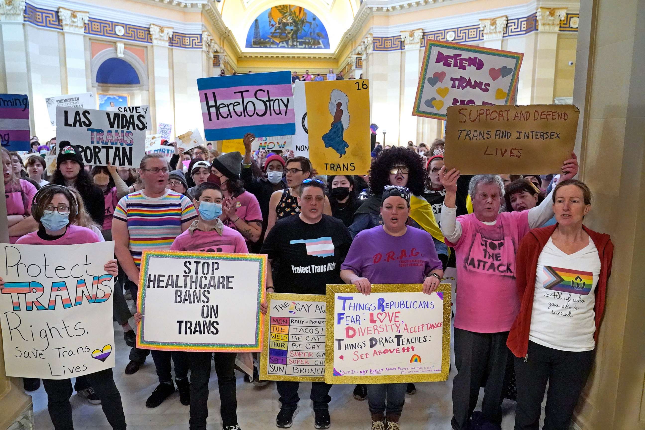 PHOTO: Trans-rights protest outside the House chamber at the state Capitol before the State of the State address, Feb. 6, 2023, in Oklahoma City.
