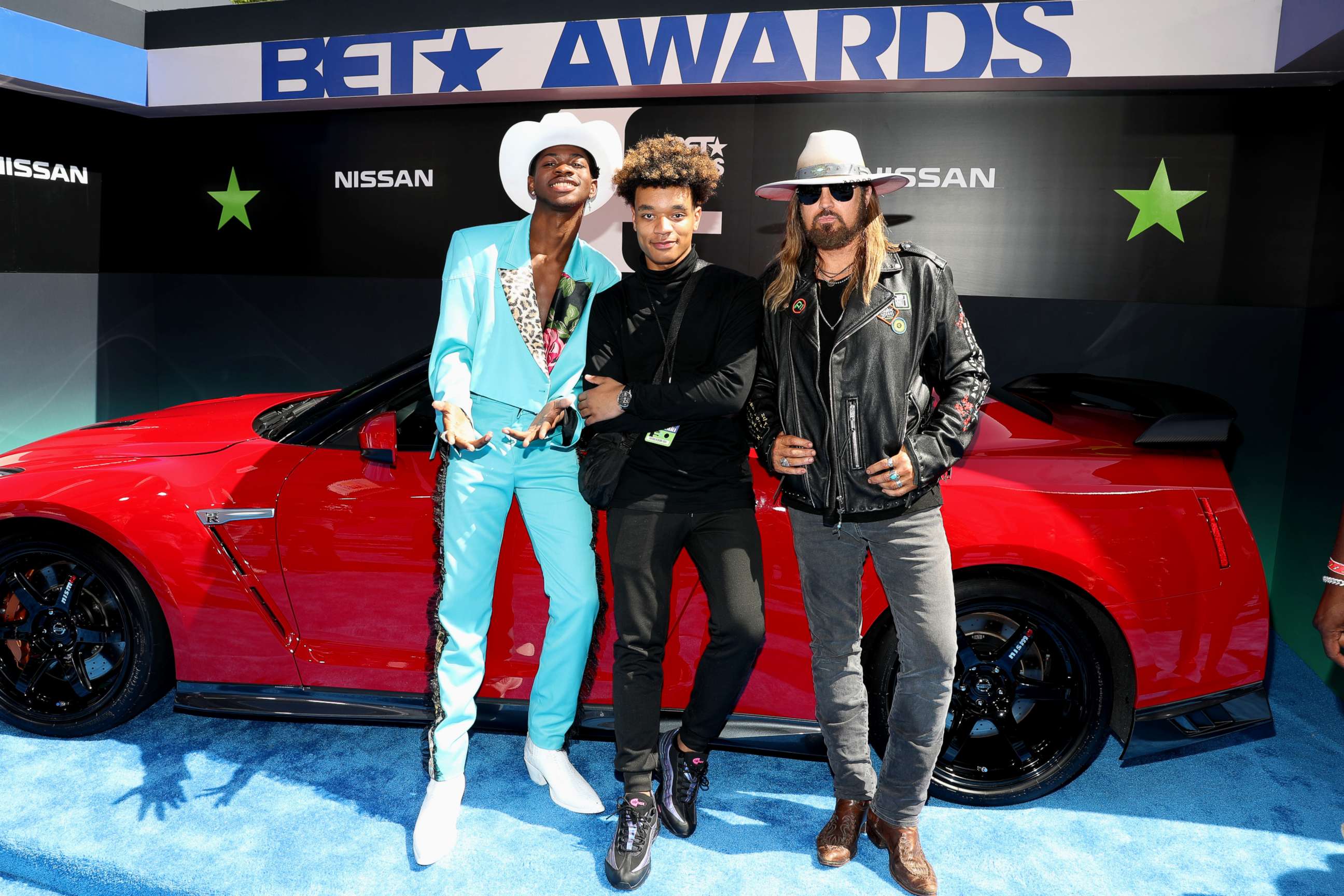 PHOTO: Lil Nas X, YoungKio, and Billy Ray Cyrus attend the 2019 BET Awards at Microsoft Theater on June 23, 2019 in Los Angeles.