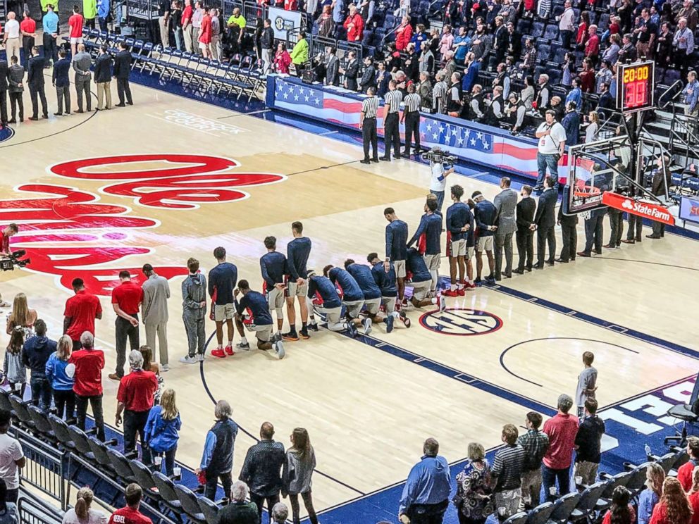 PHOTO: Six Mississippi basketball players take a knee during the national anthem before an NCAA college basketball game against Georgia in Oxford, Miss., Feb. 23, 2019.