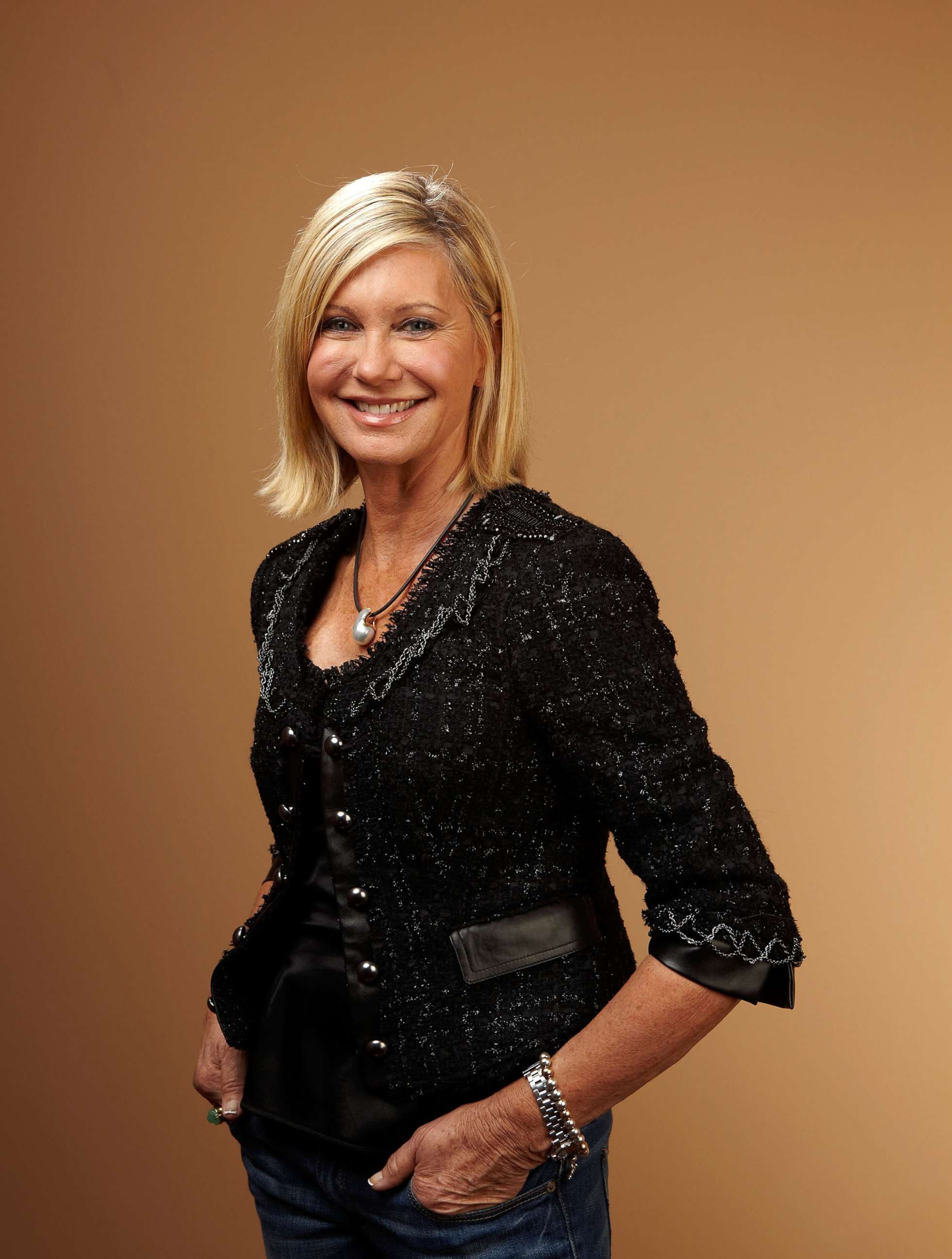 PHOTO: In this Sept. 10, 2010, file photo, Olivia Newton John poses for a portrait during the 2010 Toronto International Film Festival in Toronto, Canada.