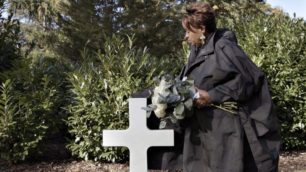 PHOTO: Ollie Gordon, one of Emmett Till's cousins, visits his father Louis Till's grave in France.