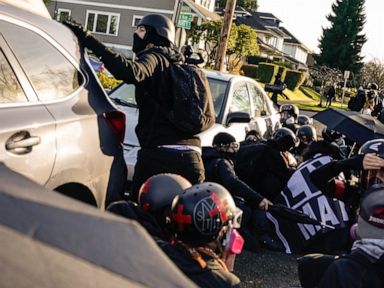 1 person shot as protesters clash in Washington state
