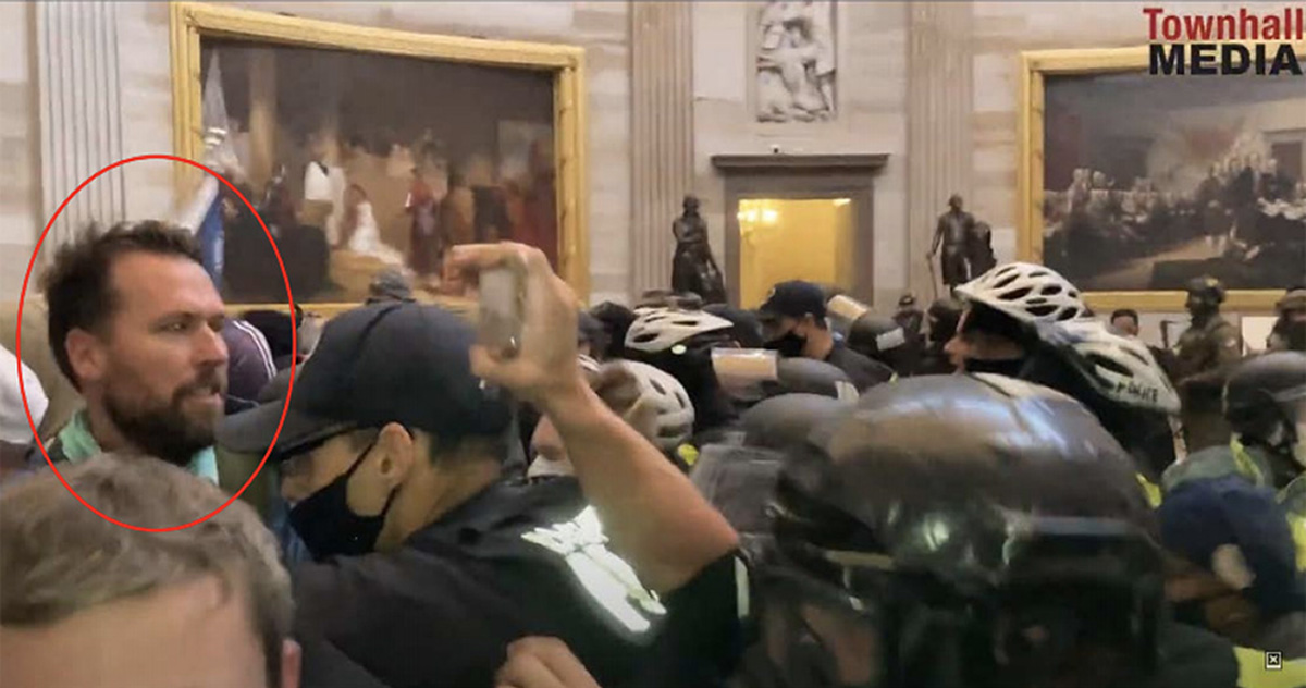 PHOTO: A man wearing what appears to be a U.S. Olympics jacket is seen among the crowd that breached security and entered the U.S. Capitol during violent protests on Jan. 6, 2021, in Washington, D.C.