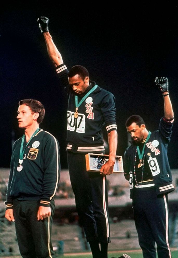 PHOTO: In this Oct. 16, 1968, U.S. athletes Tommie Smith, center, and John Carlos raises their fists during the playing of national anthem during the medal ceremony for the 200 meter run at the Summer Olympics in Mexico City.