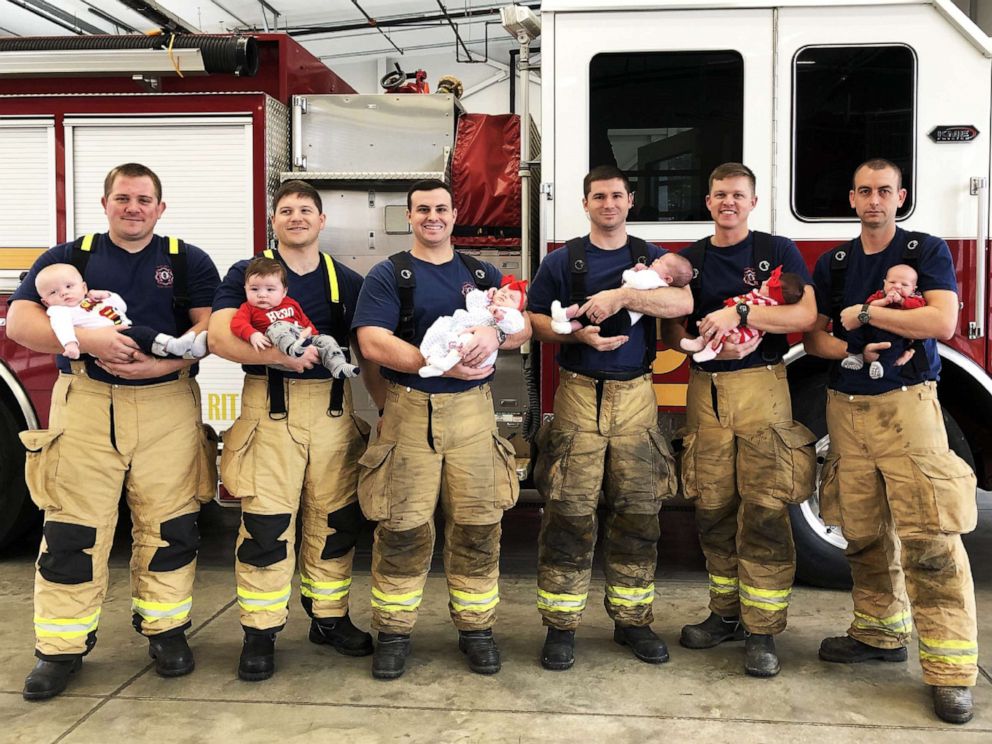 PHOTO: A photo released by the City of Opelika, Al - City Government, shows firefighters Chase McConnell, Peter Martin, Blake Smith, Kevin Swatts, Bradley Bowen and John Manley holding six babies.