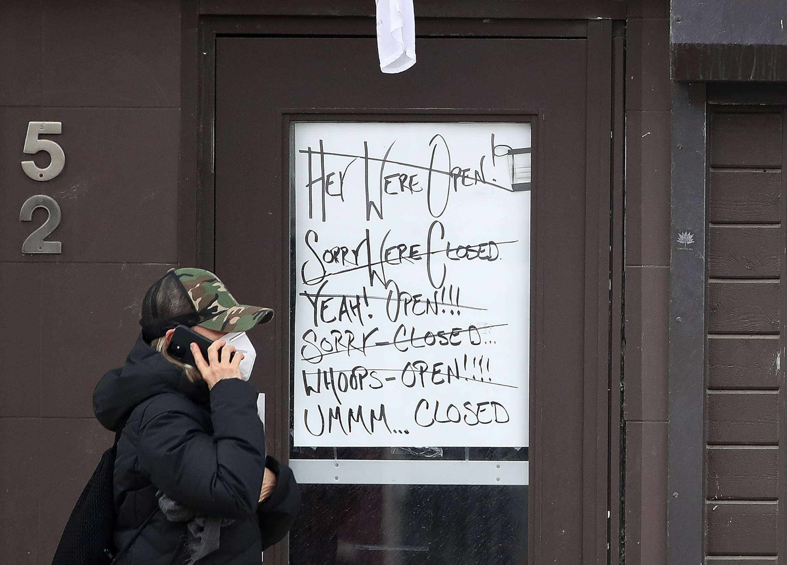 PHOTO: A sign in a window of a business expresses frustration with lockdowns, April 5, 2021, in Ontario, Canada.