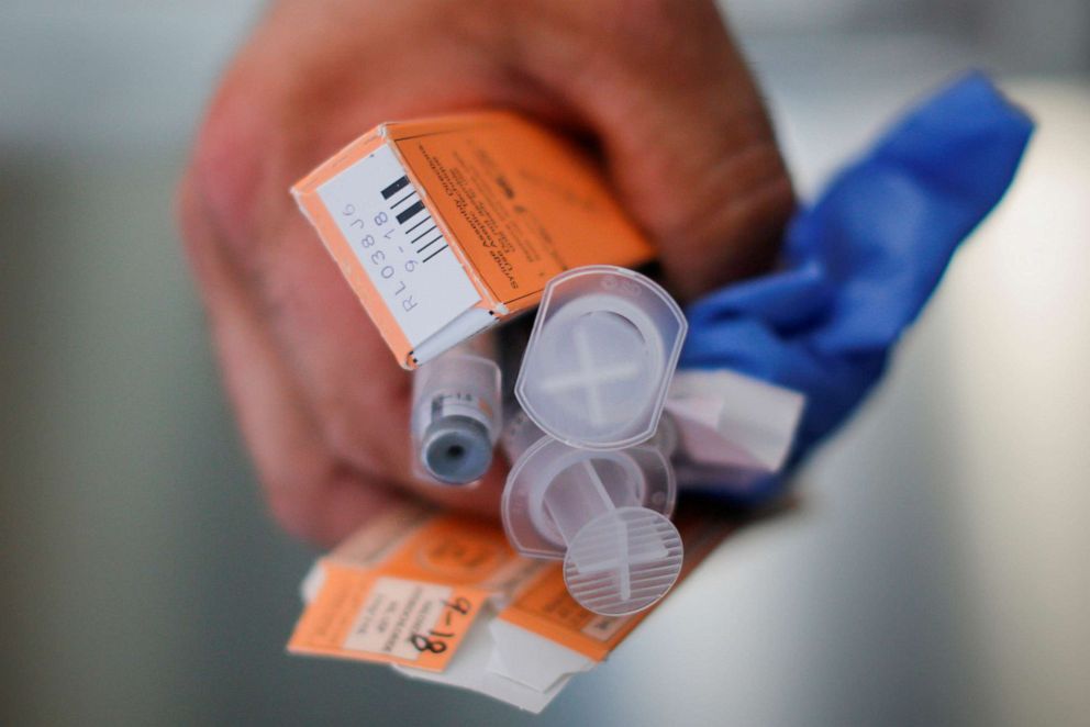 PHOTO: An Ambulance medic holds used doses of naloxone after medics revived a man in his 40's who was found unresponsive from an opioid overdose in the Boston suburb of Salem, Mass., Aug. 9, 2017. 