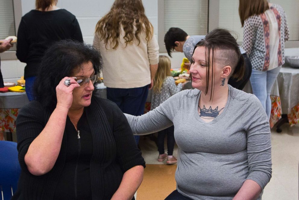 PHOTO: Deborah sits with her daughter Tera during a special Thanksgiving day visit at the jail.