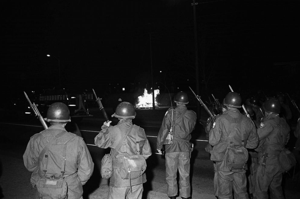 PHOTO: National Guardsmen back up highway patrolmen who charged firebomb-throwing Black students near the main entrance to the South Carolina State College in Orangeburg, S.C., Feb. 12, 1968.