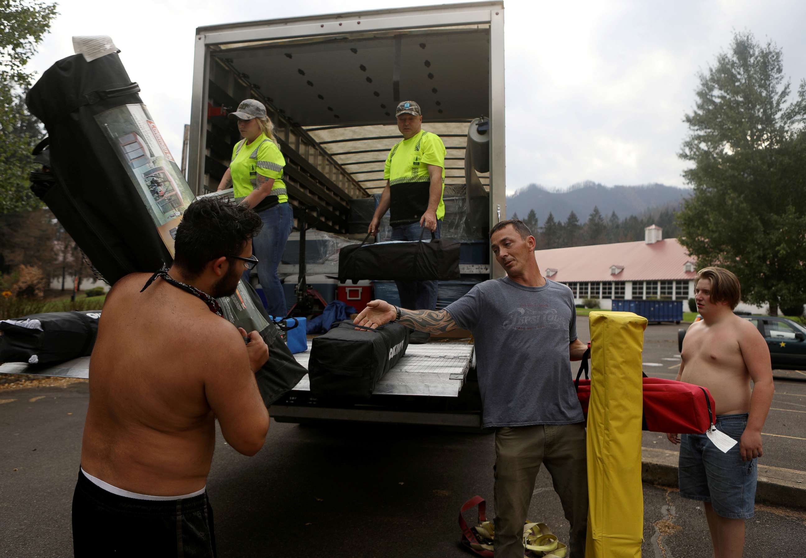 PHOTO: Volunteers and Lane County employees unload supplies for the community after a wildfire came through the area in Blue River, Ore., Sept. 23, 2020.