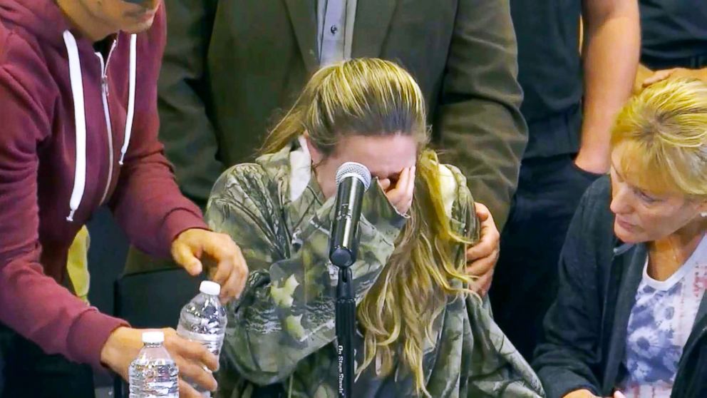PHOTO: Meghan Valencia breaks down at a news conference as she asked for prayers for her husband, Officer Kevin Valencia, who was shot in the head by a man who allegedly killed four children he took hostage and himself. 