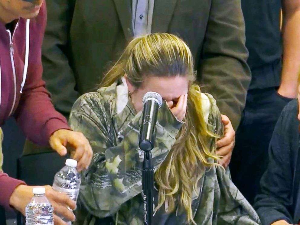PHOTO: Meghan Valencia breaks down at a news conference as she asked for prayers for her husband, Officer Kevin Valencia, who was shot in the head by a man who allegedly killed four children he took hostage and himself.