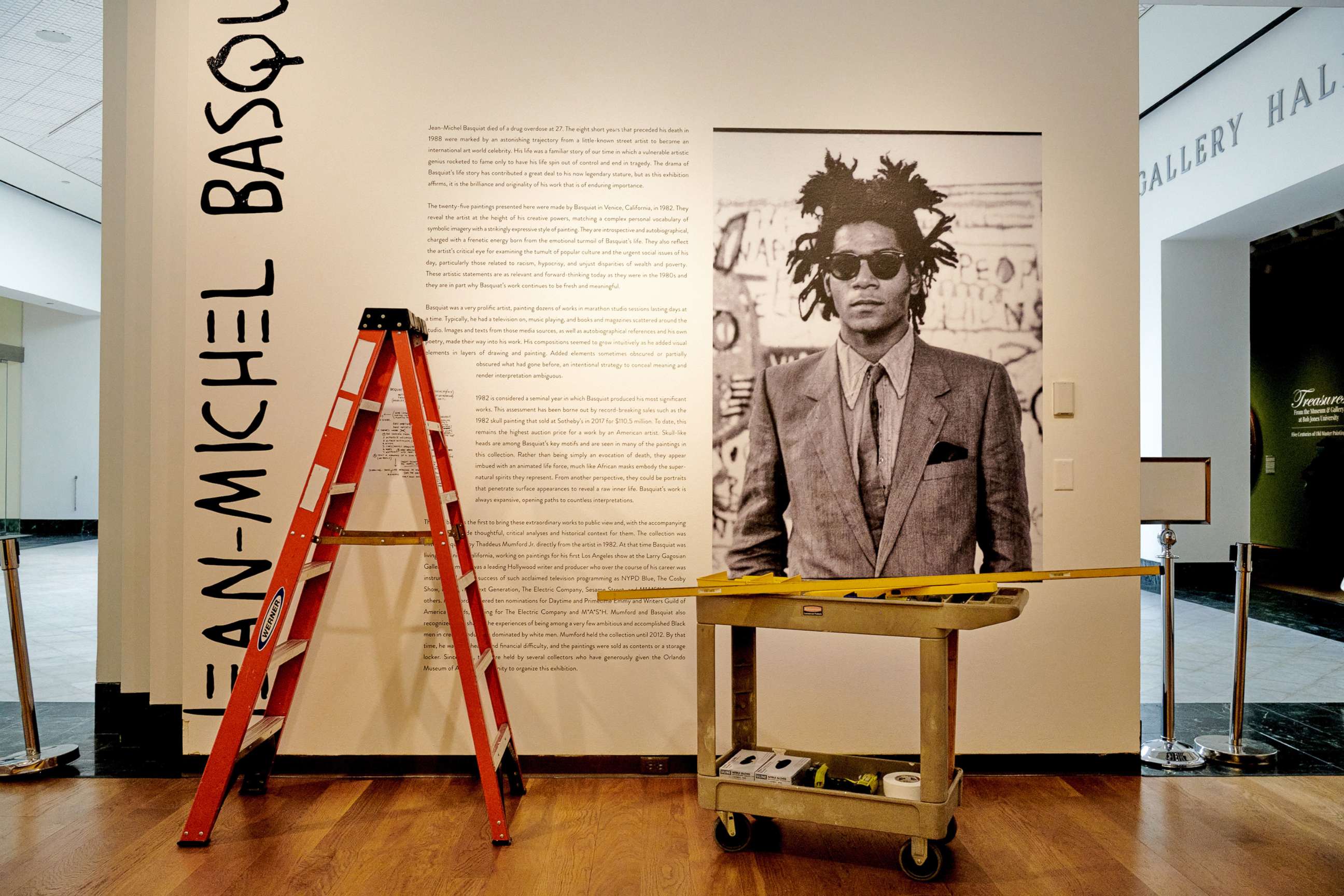 PHOTO: In this Feb. 2, 2022, file photo, the sign for the exhibit "Heroes & Monsters: Jean-Michel Basquiat" is shown at the Orlando Museum of Art, in Orlando, Fla.