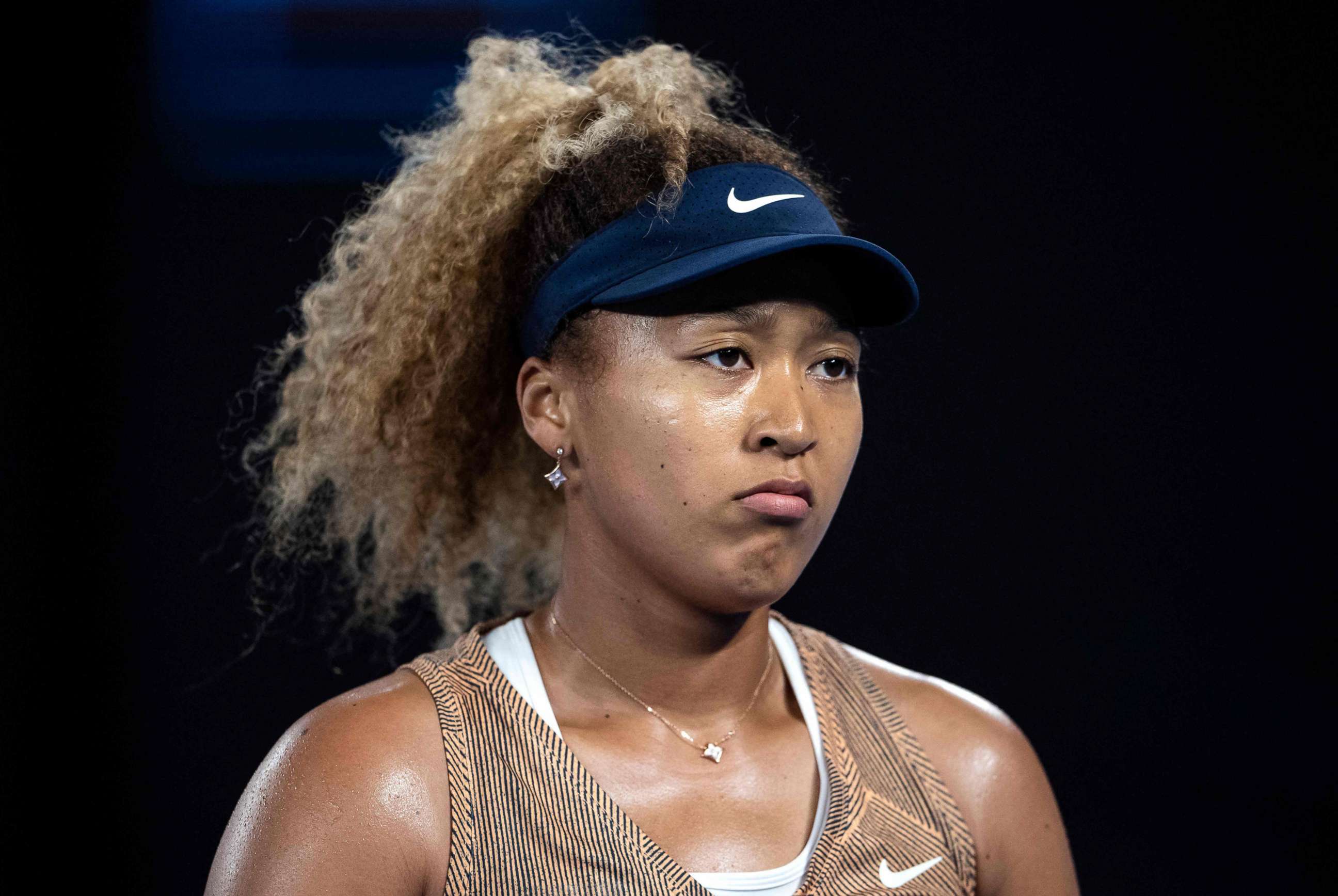 PHOTO: Naomi Osaka of Japan reacts on a point during her women's singles match against Andrea Petkovic of Germany at the Melbourne Summer Set tennis tournament in Australia, Jan. 7, 2022.