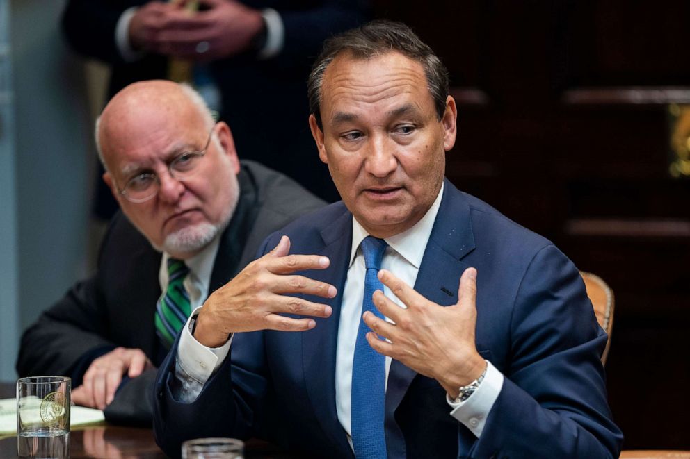 PHOTO: United Airlines CEO Oscar Munoz speaks to President Donald Trump during a meeting between the president and airline CEO's to discuss the coronavirus outbreak in the Roosevelt Room of the White House, in Washington, March 4, 2020.