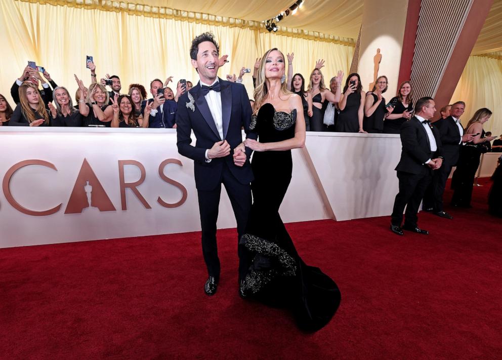 PHOTO: Adrien Brody and British fashion designer Georgina Chapman attend the 97th Annual Oscars, Mar. 2, 2025 in Los Angeles.