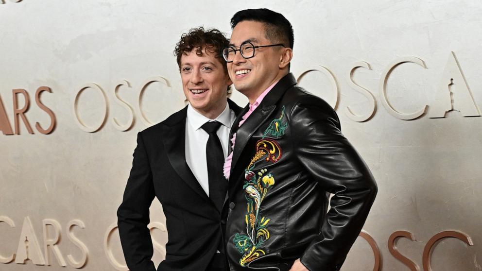PHOTO: Ethan Slater and Bowen Yang attend the 97th Annual Oscars, Mar. 2, 2025 in Los Angeles.