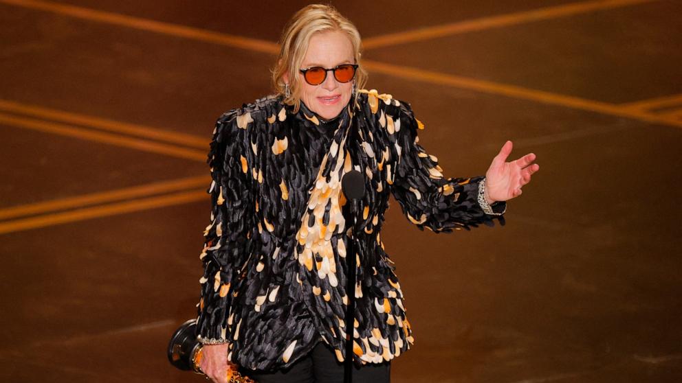 PHOTO: Amy Madigan accepts the Oscar for Best Supporting Actress for "Weapons" at the 98th Academy Awards, March 15, 2026 in Hollywood, Calif.