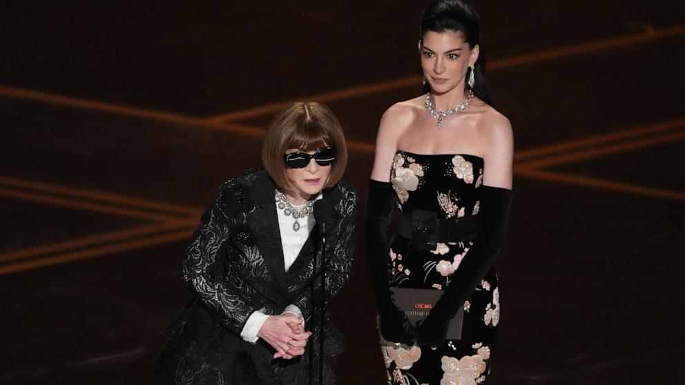 PHOTO: Anna Wintour and Anne Hathaway present the award for best costume design at the 98th Academy Awards, March 15, 2026 in Hollywood, Calif.