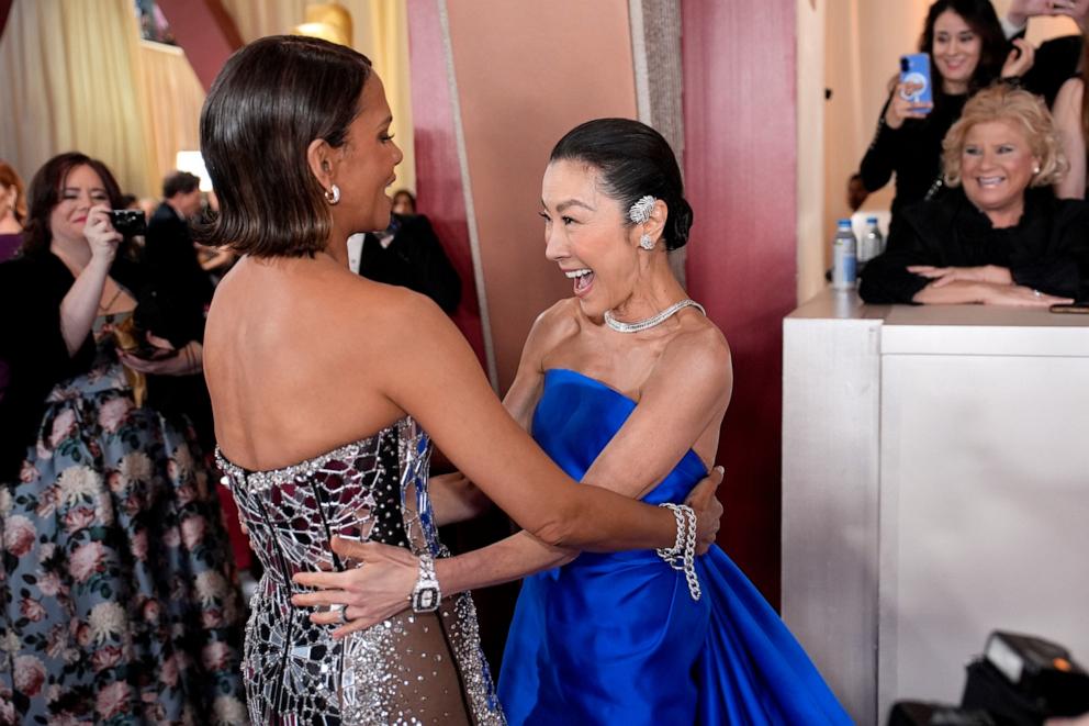 PHOTO: Halle Berry and Michelle Yeoh arrive at the Oscars, Mar. 2, 2025, in Los Angeles. 