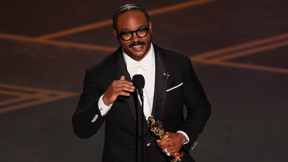 PHOTO: Ryan Coogler accepts the award for Best Writing (Original Screenplay) for "Sinners" at the 98th Academy Awards, March 15, 2026 in Hollywood, Calif.