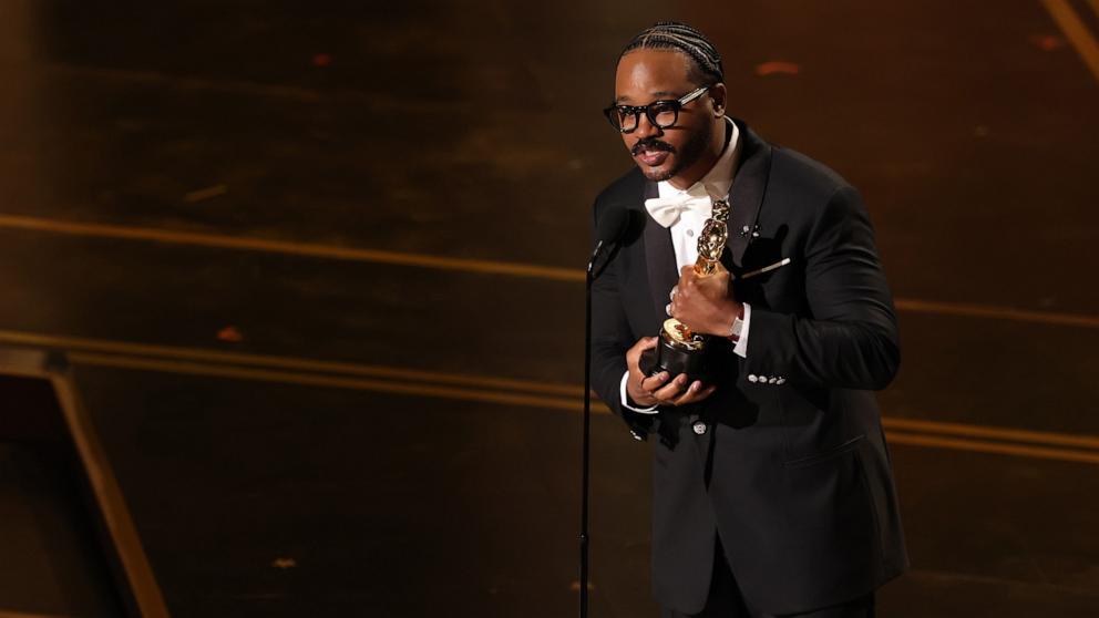 PHOTO: Ryan Coogler accepts the award for Best Writing (Original Screenplay) for 'Sinners' at the 98th Academy Awards, March 15, 2026 in Hollywood, Calif.