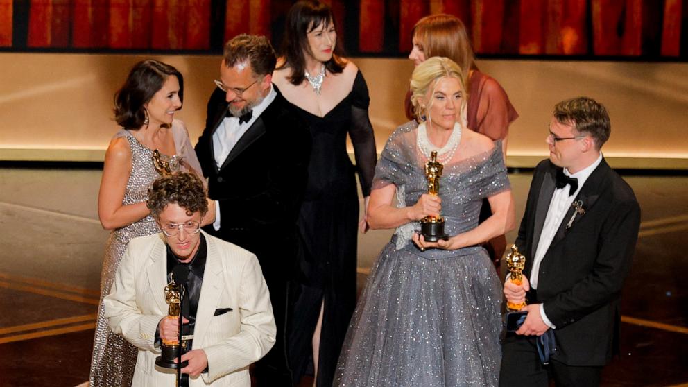 PHOTO: David Borenstein, Pavel Talankin, Helle Faber and Alzbeta Karaskova win the Oscar for Best Documentary Feature Film for "Mr. Nobody Against Putin" at the 98th Academy Awards, March 15, 2026 in Hollywood, Calif.