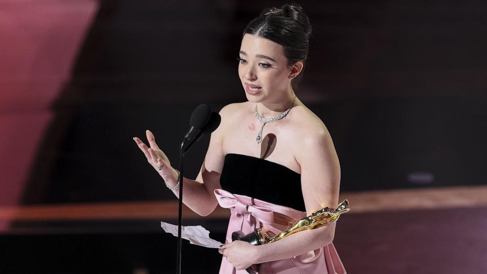 PHOTO: Mikey Madison accepts the Oscar for Best Performance By An Actress In A Leading Role for 'Anora' during the 97th annual Academy Awards in Los Angeles, Mar. 2, 2025.