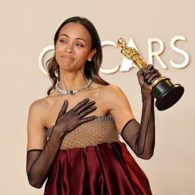 PHOTO: Zoe Saldana, winner of the Best Actress in a Supporting Role poses in the press room during the 97th Annual Oscars, Mar. 2, 2025 in Los Angeles.