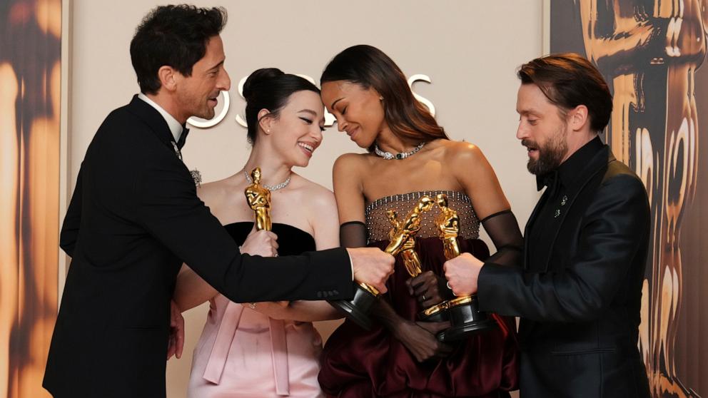 PHOTO: Adrien Brody, Mikey Madison, Zoe Saldana, and Kieran Culkin pose in the press room at the Oscar, Mar. 2, 2025, in Los Angeles. 