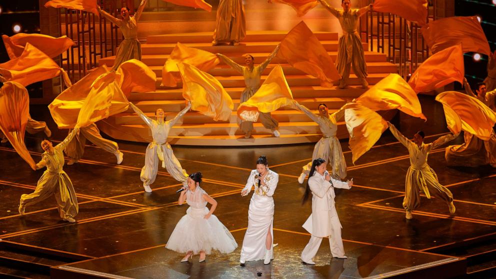 PHOTO: Rei Ami, EJAE, and Audrey Nuna performs on stage at the 98th Academy Awards, March 15, 2026 in Hollywood, Calif.