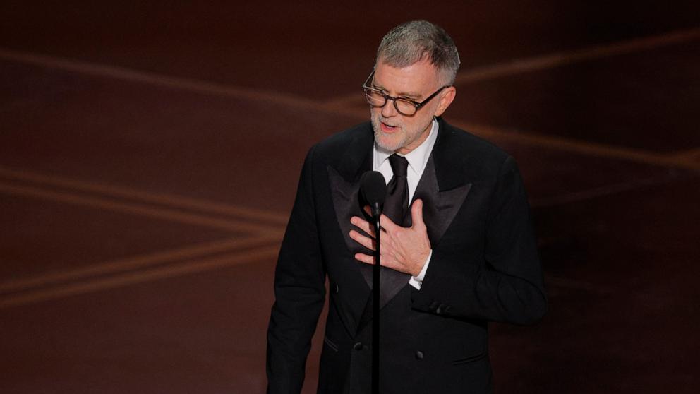 PHOTO: Paul Thomas Anderson accepts the Oscar for Best Director for "One Battle after Another" at the 98th Academy Awards, March 15, 2026 in Hollywood, Calif.