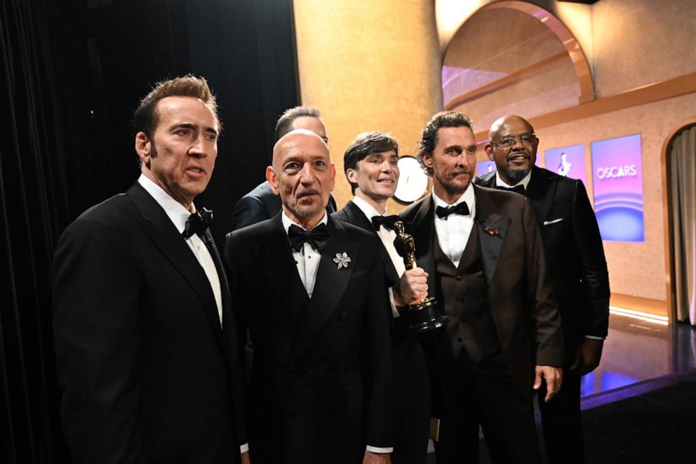 PHOTO: Cillian Murphy, winner of the Best Actor in a Leading Role poses with presenters Nicolas Cage, Ben Kingsley, Brendan Fraser, Matthew McConaughey, and Forest Whitaker backstage during the 96th Annual Academy Awards, Mar. 10, 2024, in Hollywood.